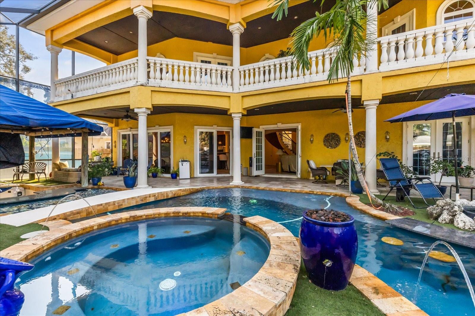 Numerous Fountains, spa waterfall to pool, large gas firepits (Blue Pots)