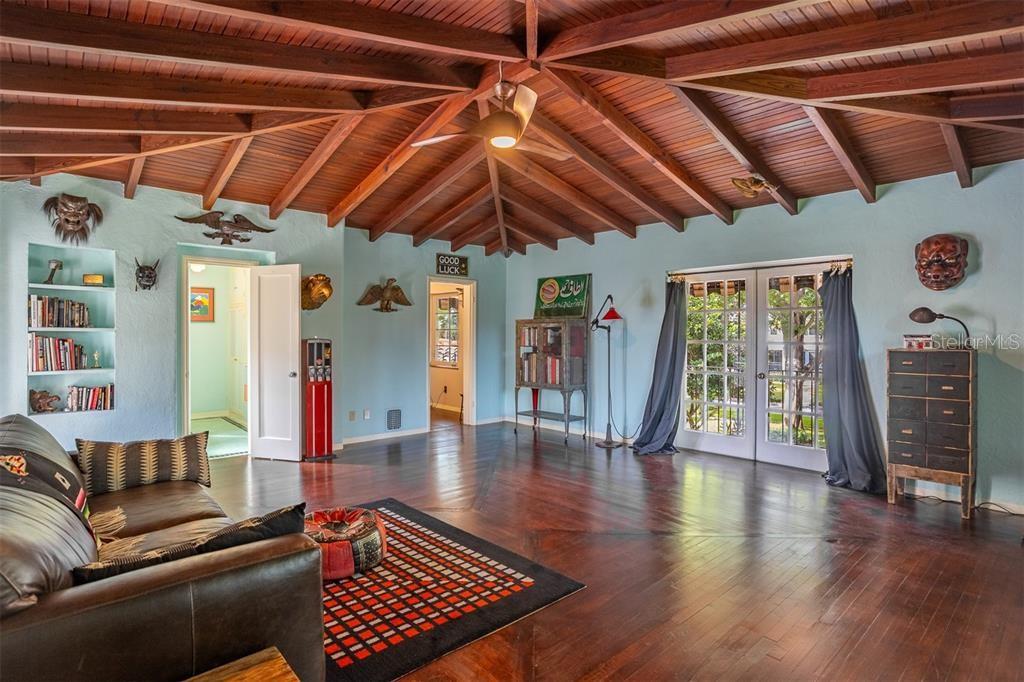 Hardwood Floors Mirror the Vaulted Hardwood Ceiling