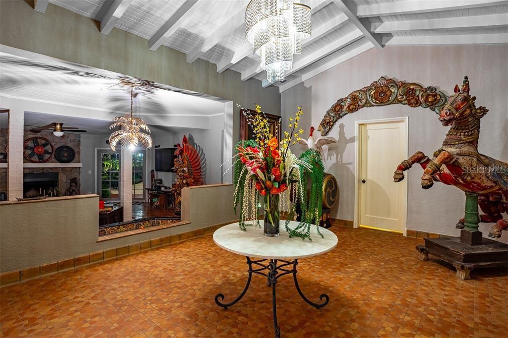 Vaulted Foyer with Flint Mosaic Tile Flooring