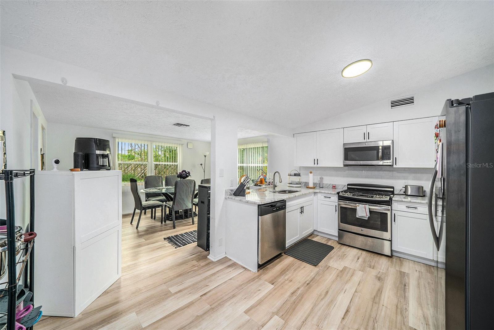Kitchen with view of dining room
