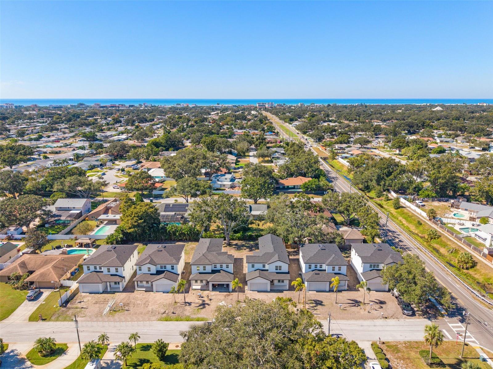 aerial of 6 homes and proximity to the beach