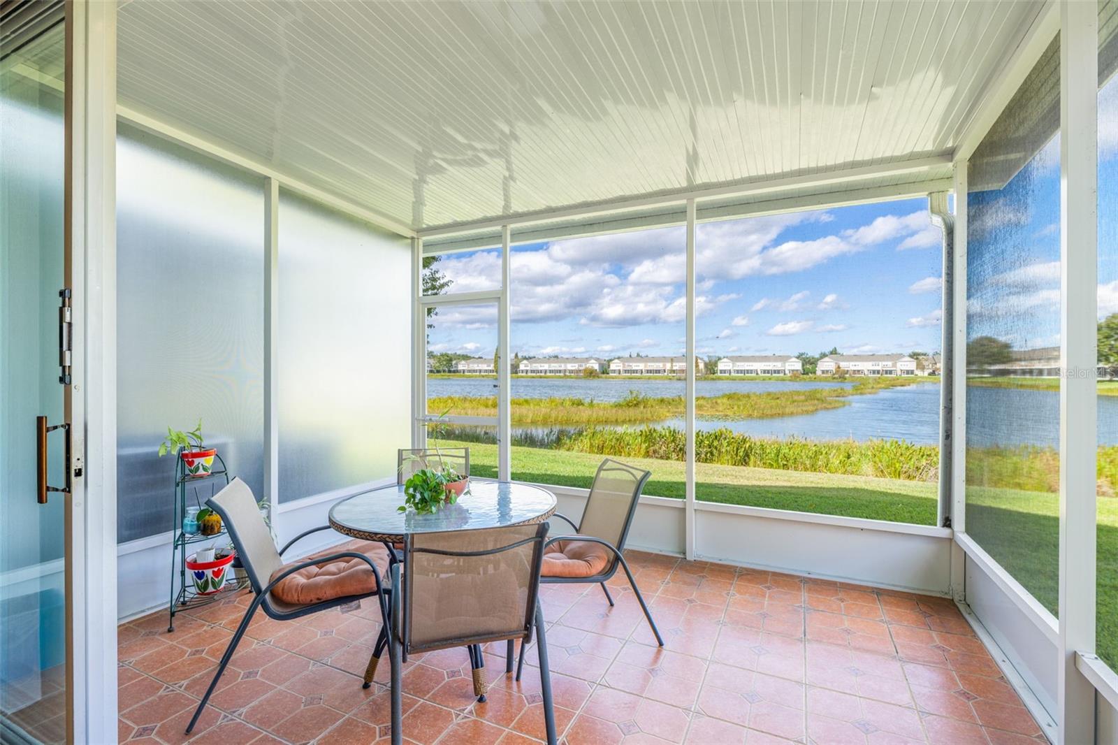 Covered Screened Porch with Tile Floor is so nice! The View is so special!