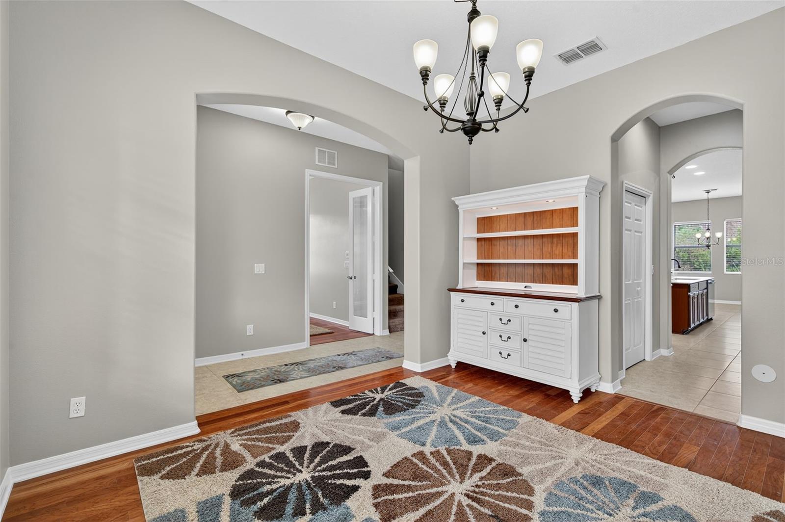 Dining room with hallway into Butler's Pantry and into Kitchen
