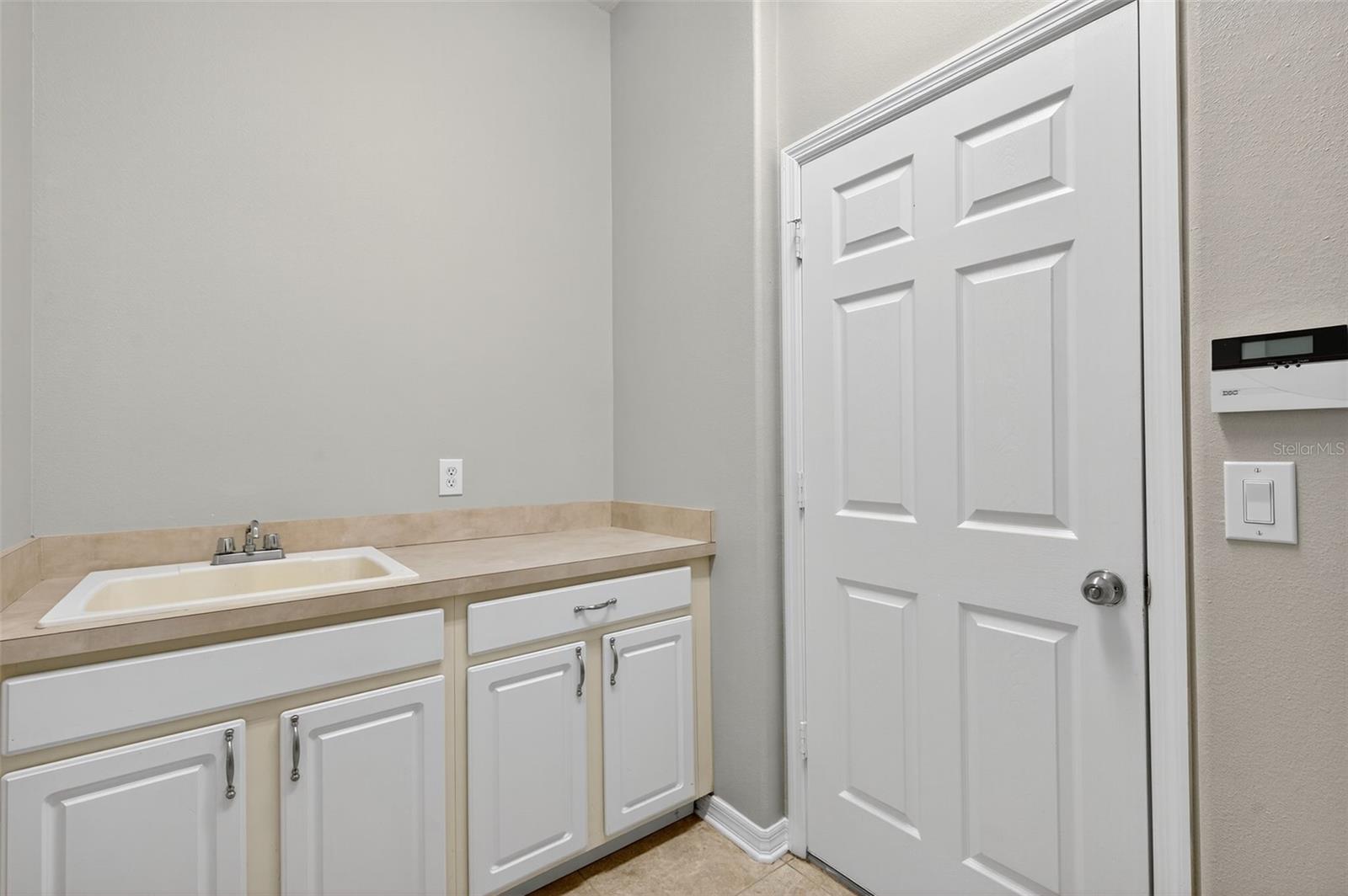 Downstairs Laundry room off of garage