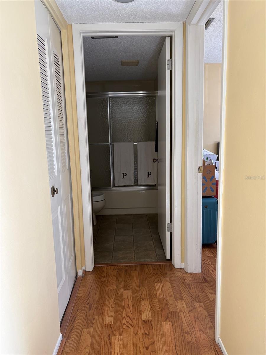 Hallway to second bathroom