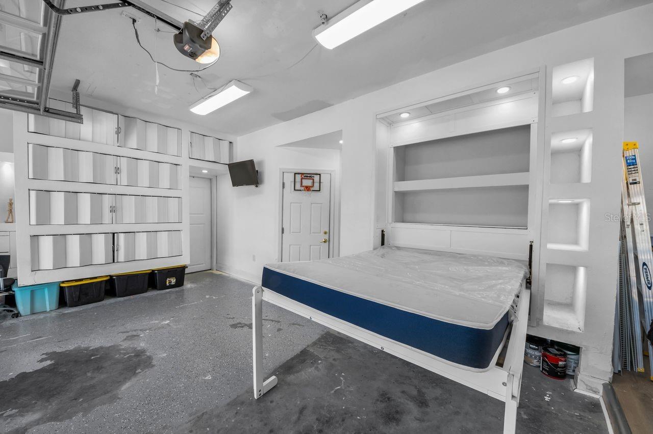 Double garage w/hidden trundle bed