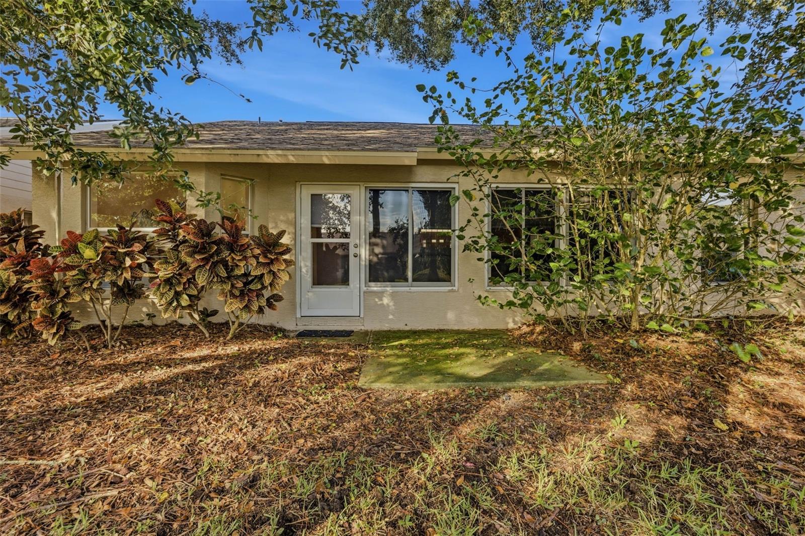 Outdoor nook shows perfect spot a bistro set or quiet reading area.