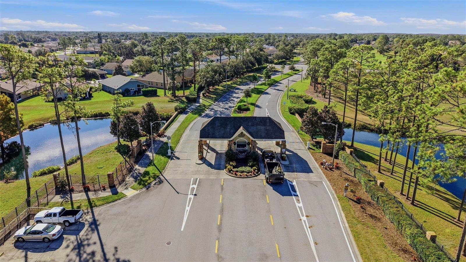 Main gated entry offers secure and welcoming access to the property