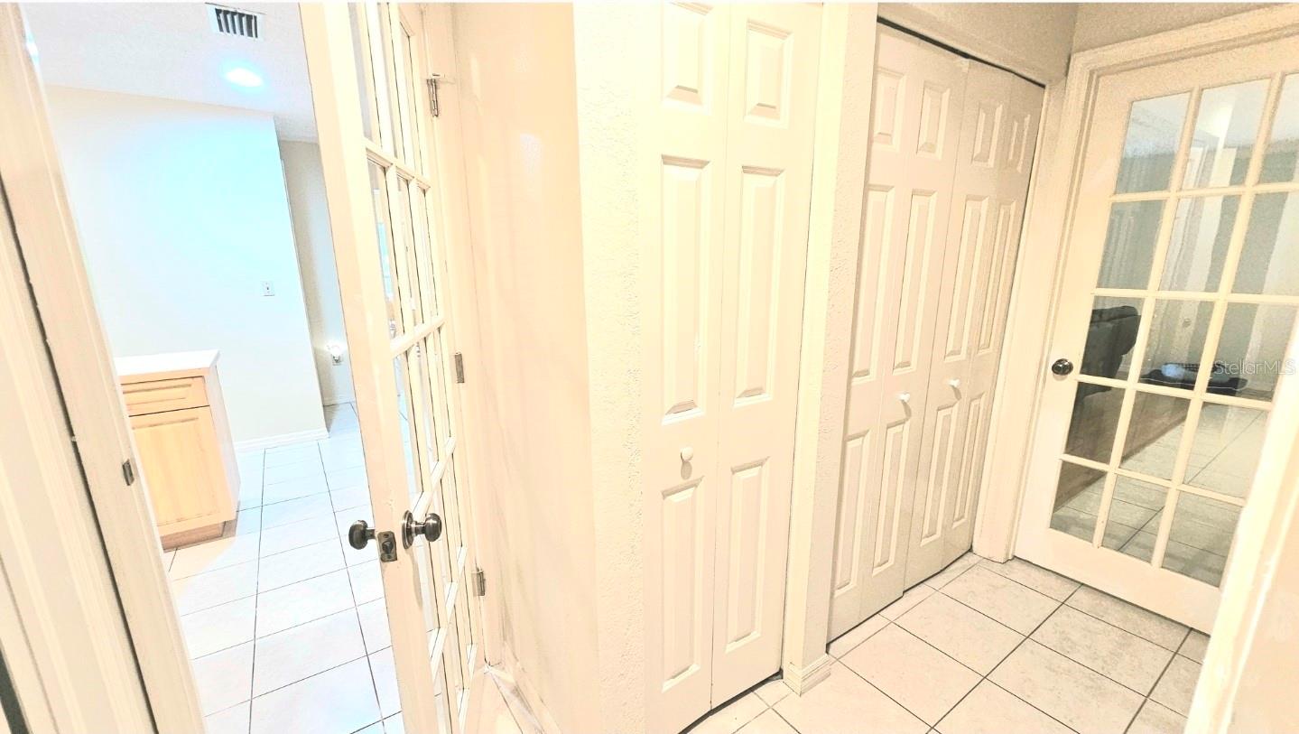 Entry to kitchen, main living room (and front) and private bath for mother-in-law suite.