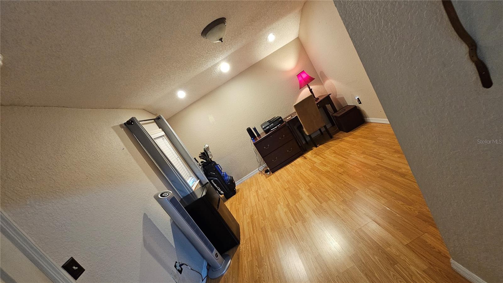 5th bedroom or office off the laundry room with bathroom access.