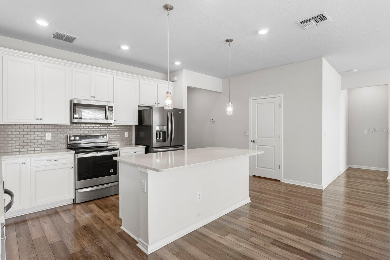 Canter Island/Bar and a Walk-In Pantry Closet