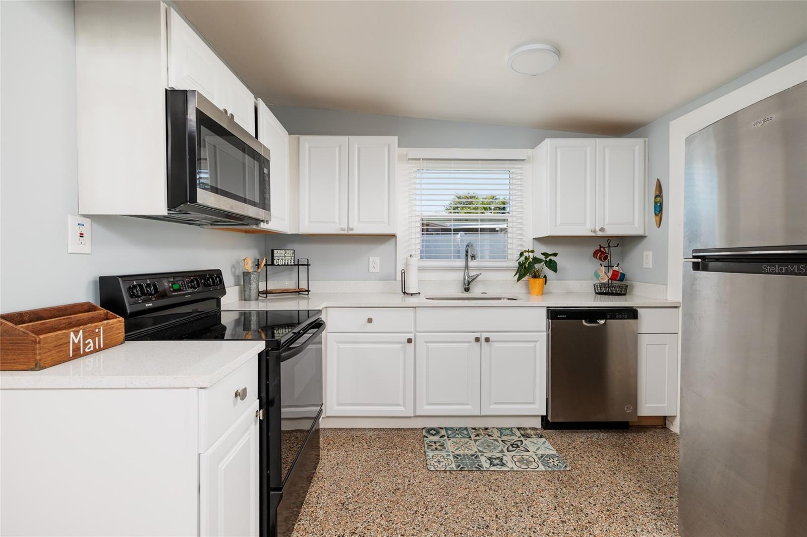 Updated Kitchen with newer cabinets & appliances.