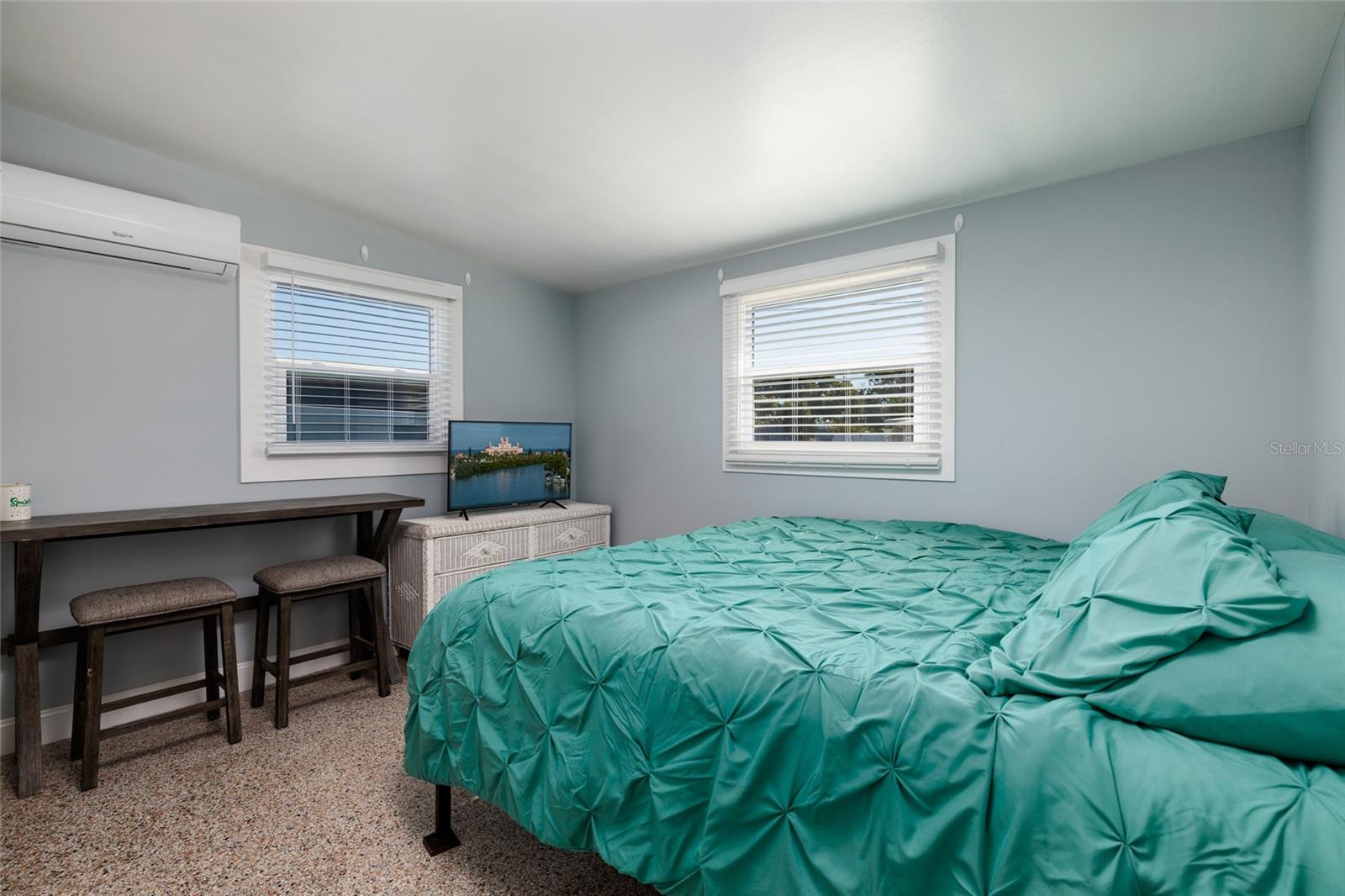 Primary corner bedroom w/Mini-Split AC/Heat System. Double pane windows.