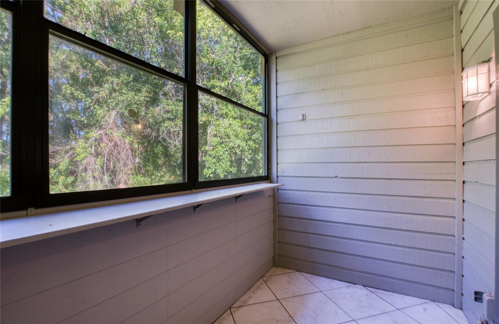 Enclosed porch off the living room