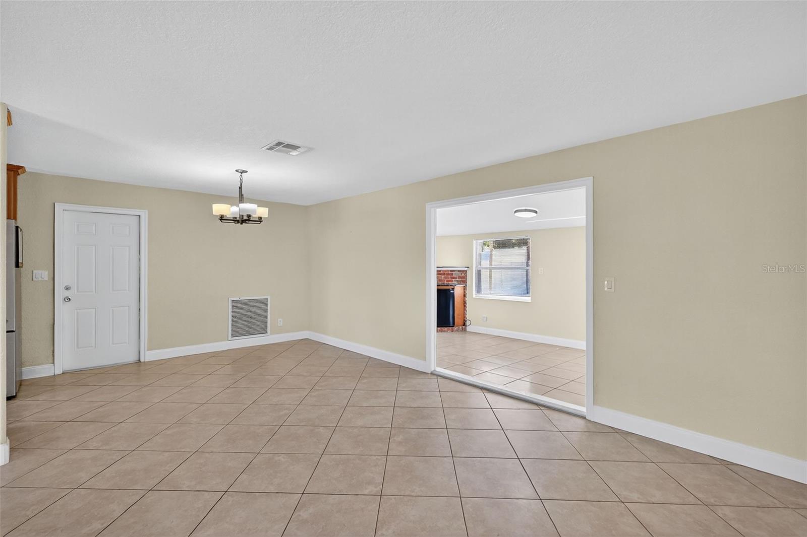 The dining room leads to the bonus room