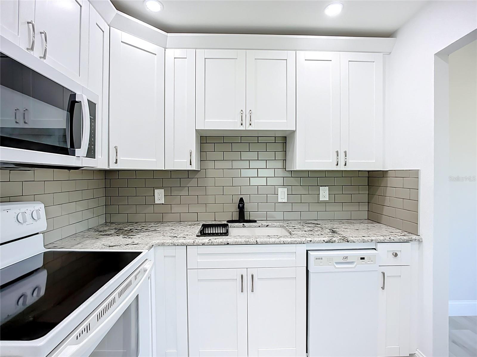 Subway tile backsplash, new fixtures and lights