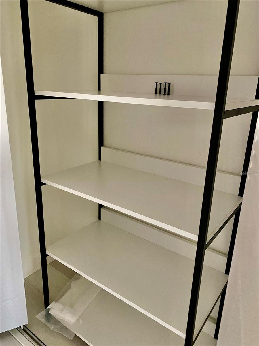Hall closet shelving