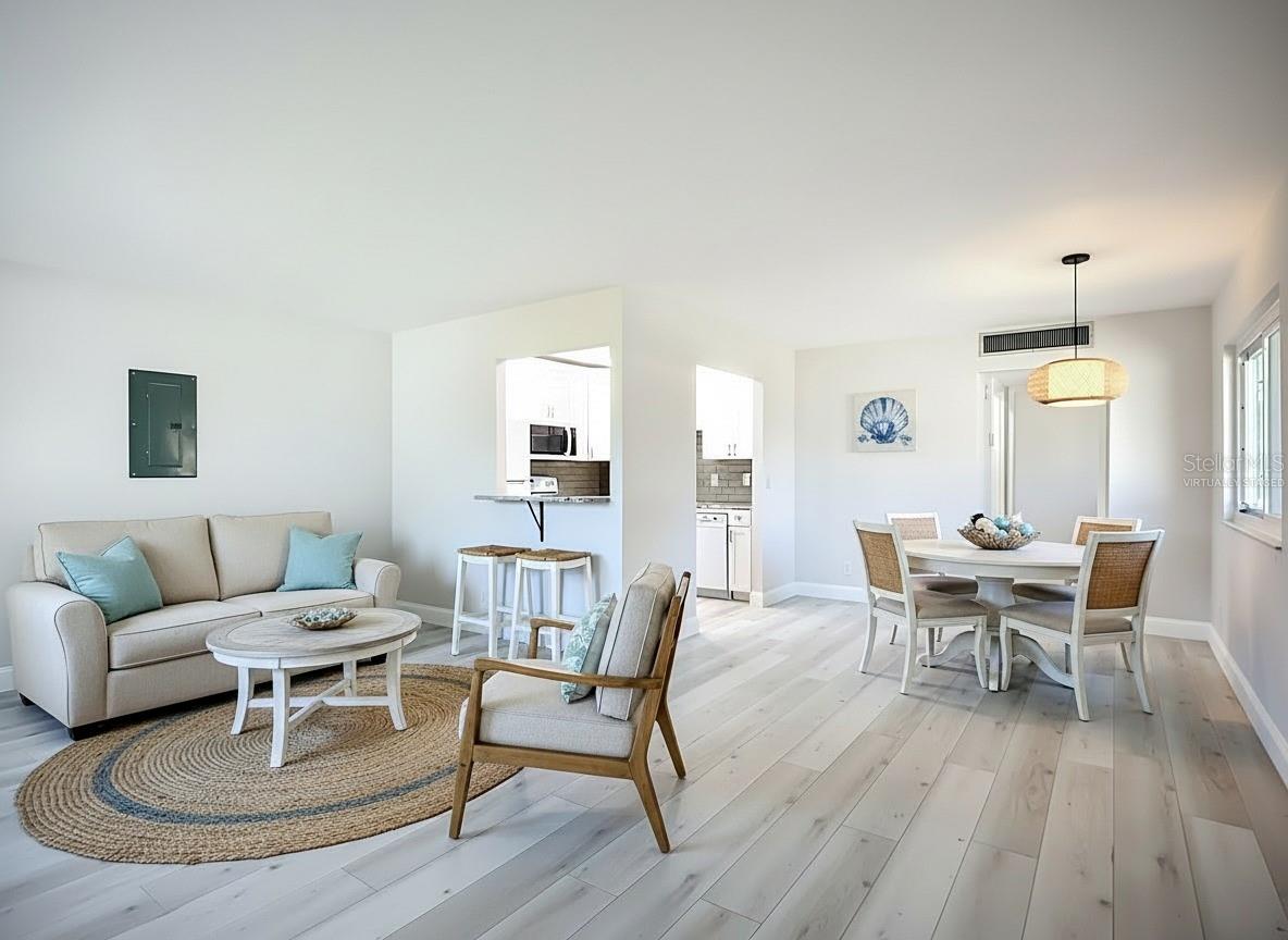 Virtually Staged. Living Room & Dining area