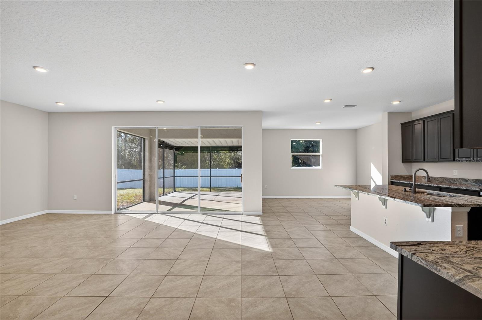 Kitchen anchors living room and dining room