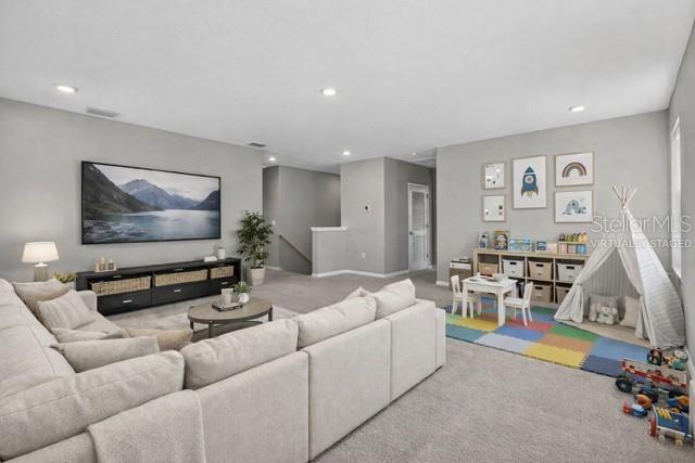 virtually staged upstairs bonus room