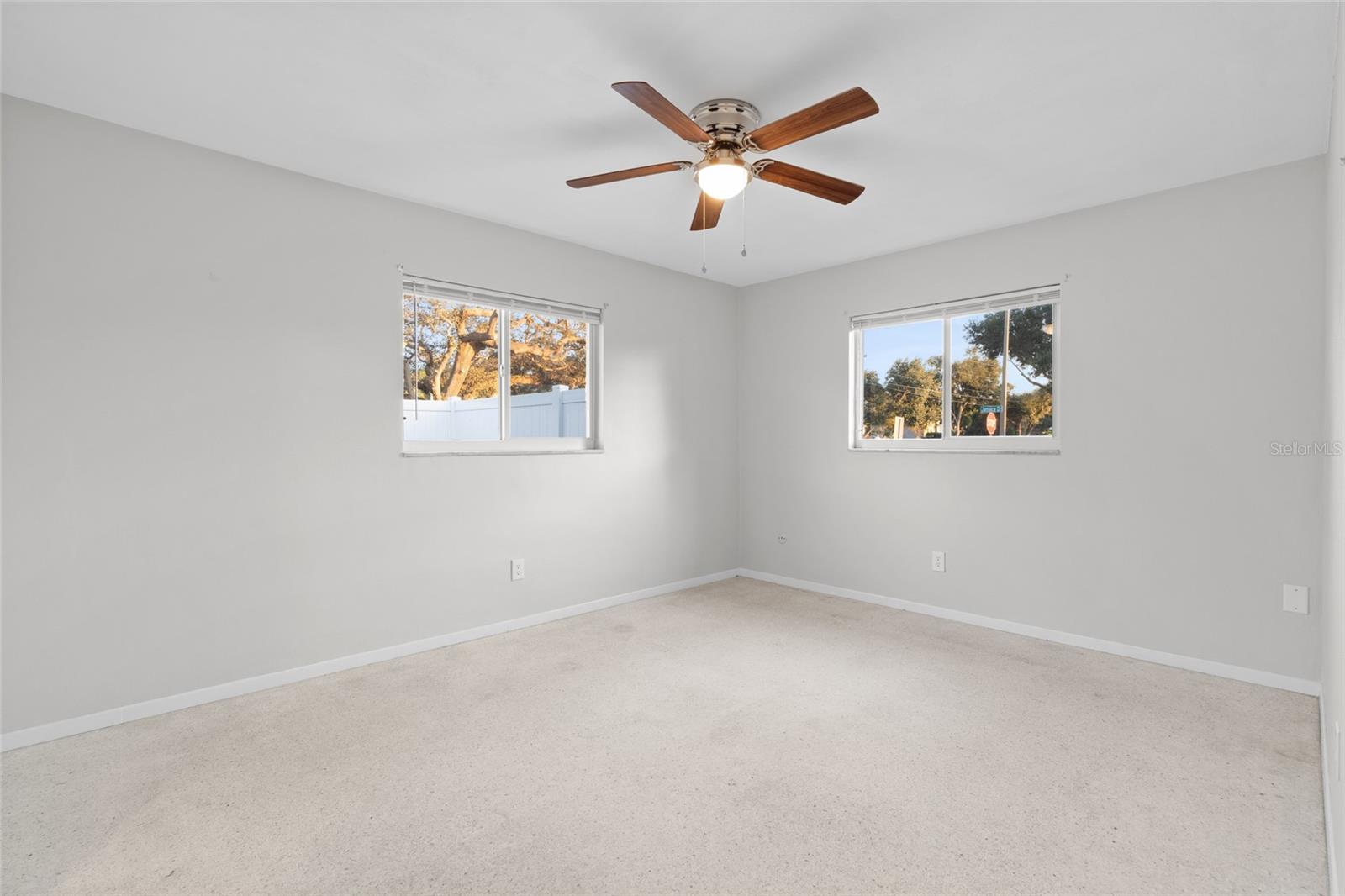 Primary bedroom with walk in closet and bathroom