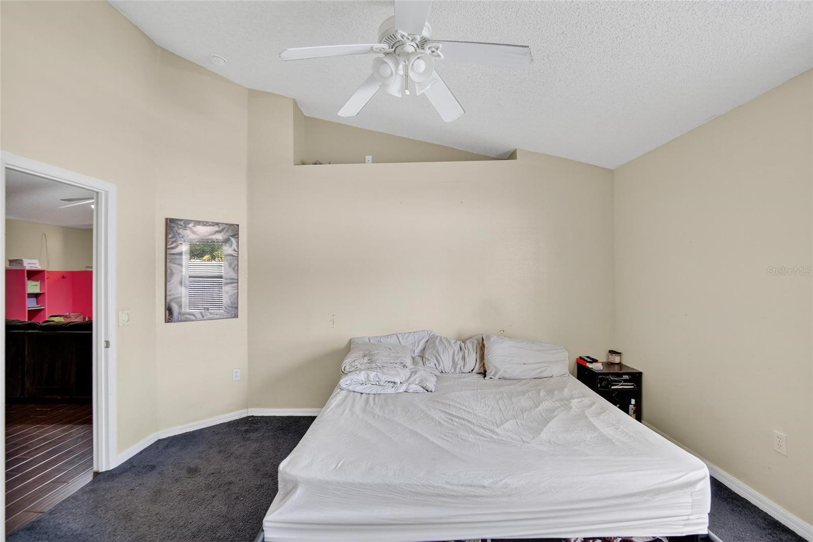 Owner's Suite.  Doorway to the dining/family room combo to the left.