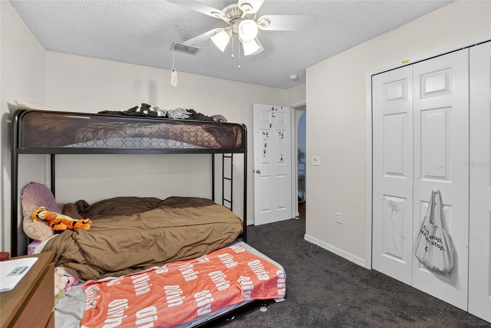 Secondary Bedroom #2.  Door to the hallway in the center.