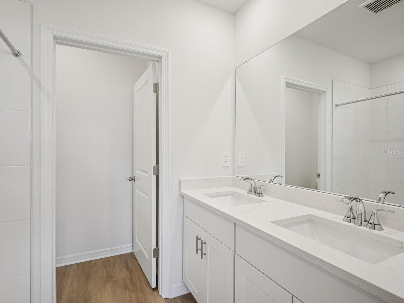 Photos are not of the actual home, but are photos of the builder home with same floorplan with similar interior finishes.