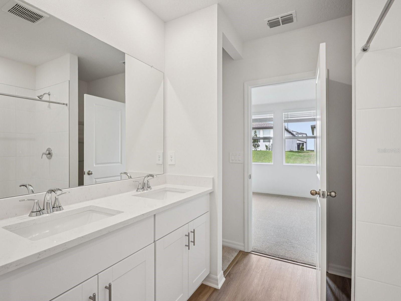 Photos are not of the actual home, but are photos of the builder home with same floorplan with similar interior finishes.