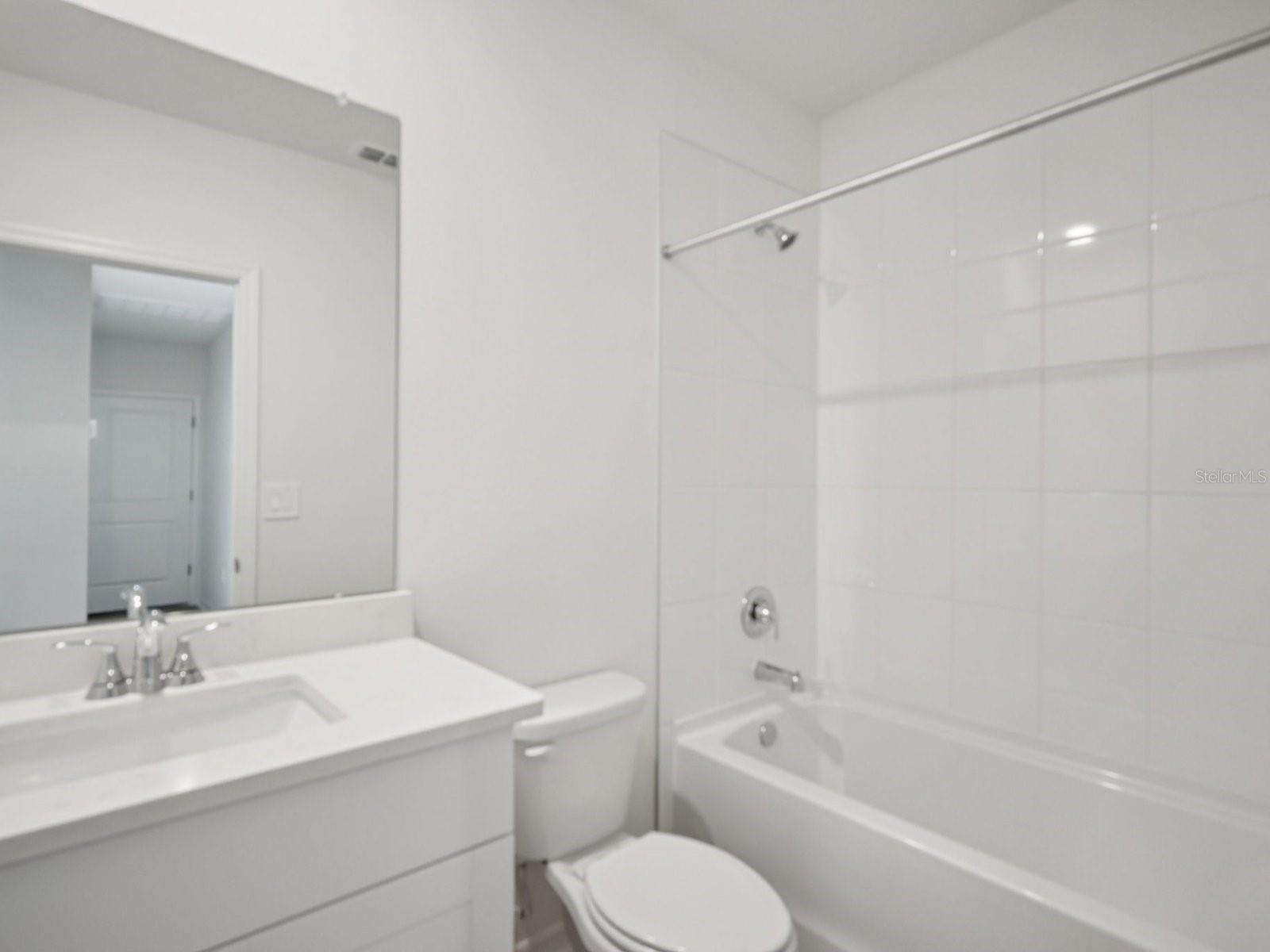 Photos are not of the actual home, but are photos of the builder home with same floorplan with similar interior finishes.