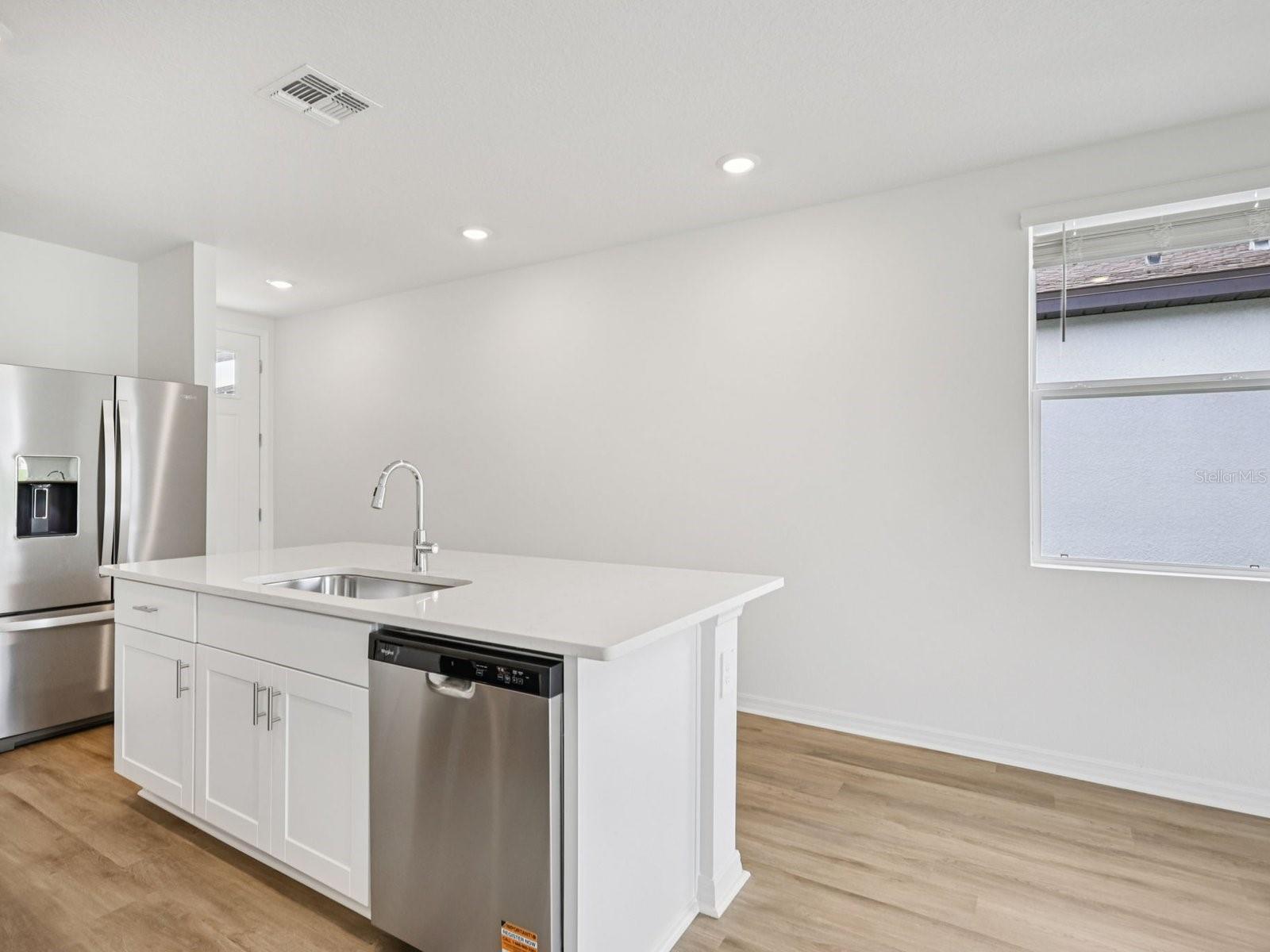 Photos are not of the actual home, but are photos of the builder home with same floorplan with similar interior finishes.