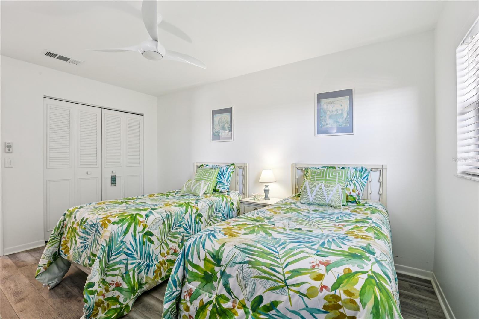 The second bedroom includes a full-size closet, providing plenty of storage for your belongings.