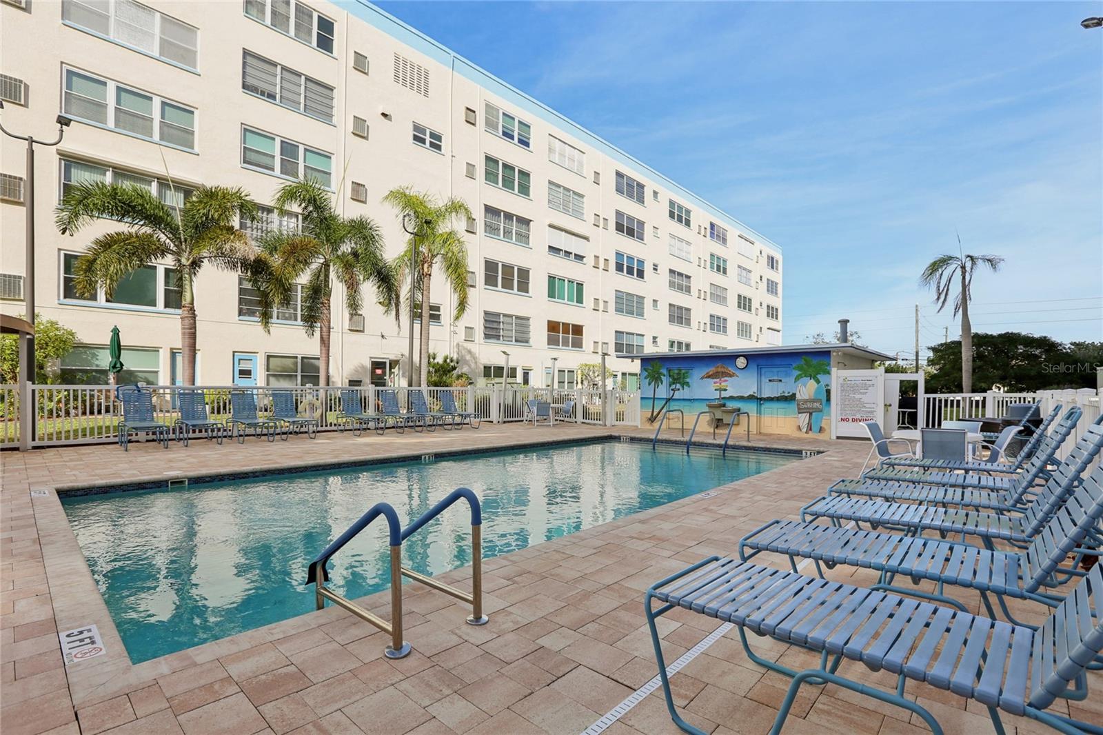 Enjoy the inviting pool and convenient restroom located just outside your secured lobby!