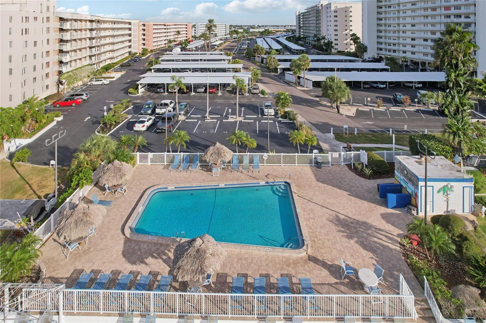 Take a leisurely walk to Pool #3, a perfect spot to unwind and soak up the Florida sunshine.
