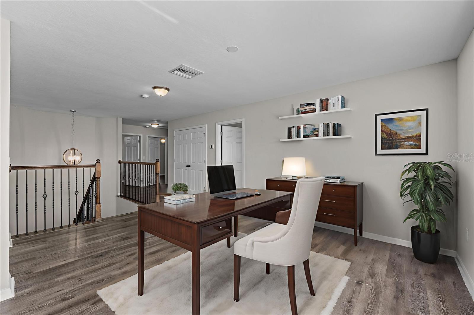 Virtually Staged, Loft, home office or play area!