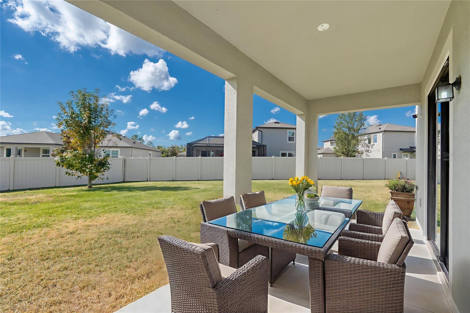 Virtually staged. Relax on the expansive patio!