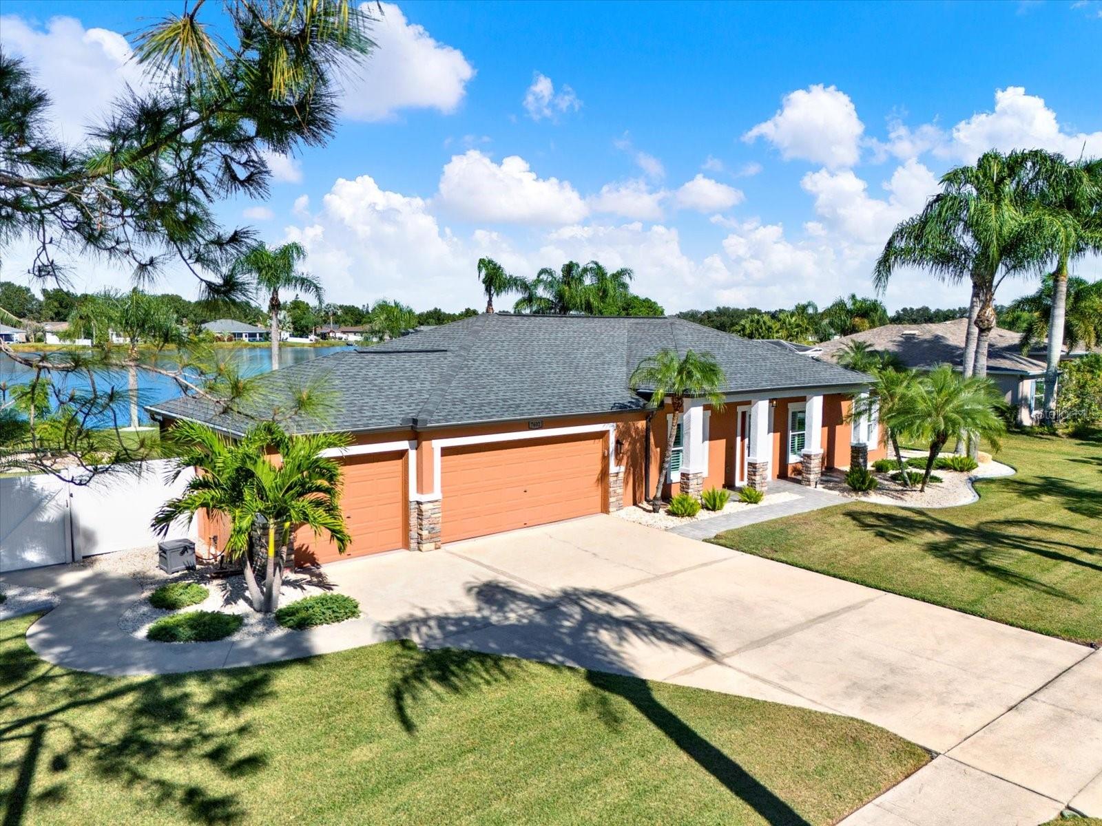 7602 Clair Wood Court is a beautiful lakefront home on an oversized lot. This 3-bedroom, 2-bath home has a den and dining room, a 3-car garage, and is the perfect-sized Florida retreat at 1,700 sq ft.