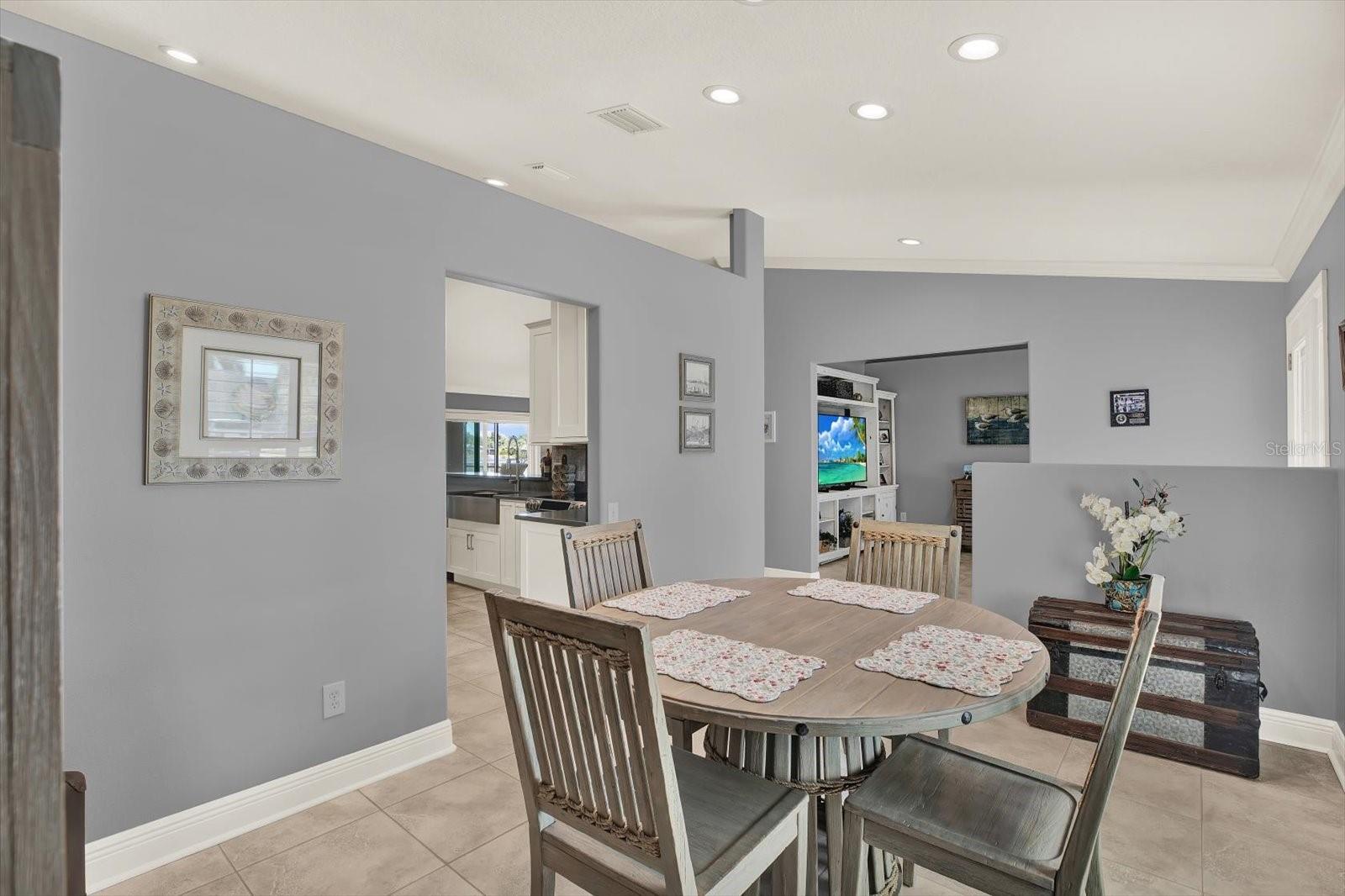 The high ceilings and breezy design with partial walls give the rooms separation while still feeling open and spacious.