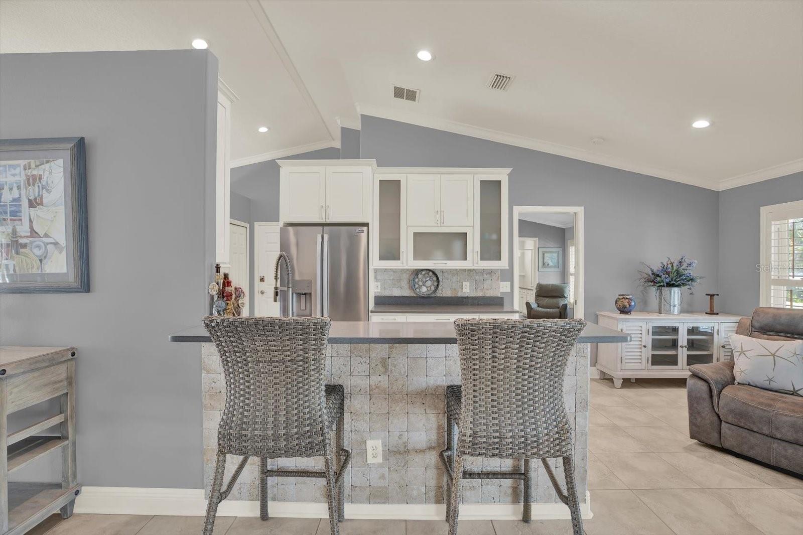 When you look from the living room to the kitchen, you feel the well curated attention to detail that has been invested into this home.