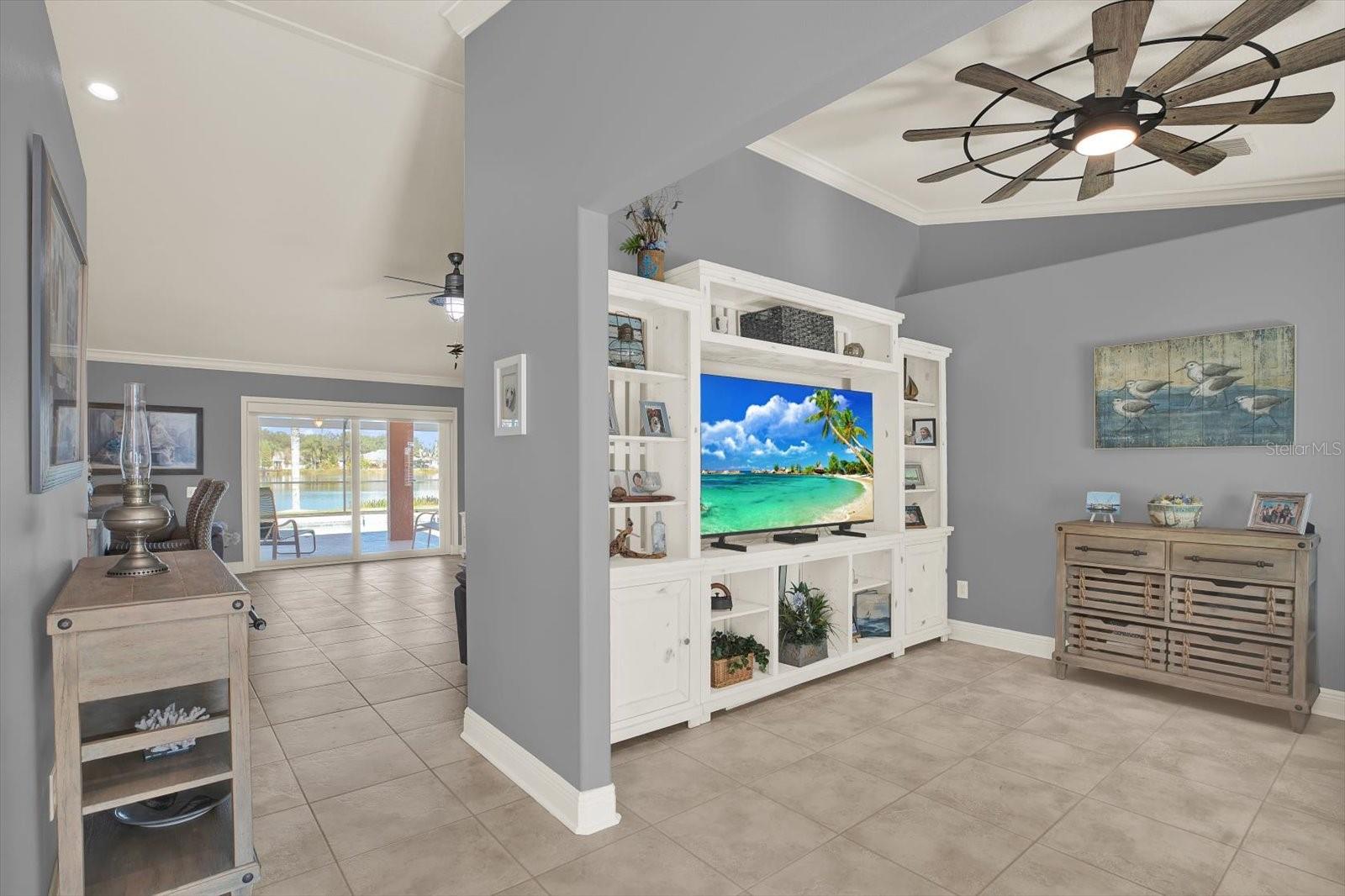 Upon entering through the front door, you are greeted with stunning views of the lake.