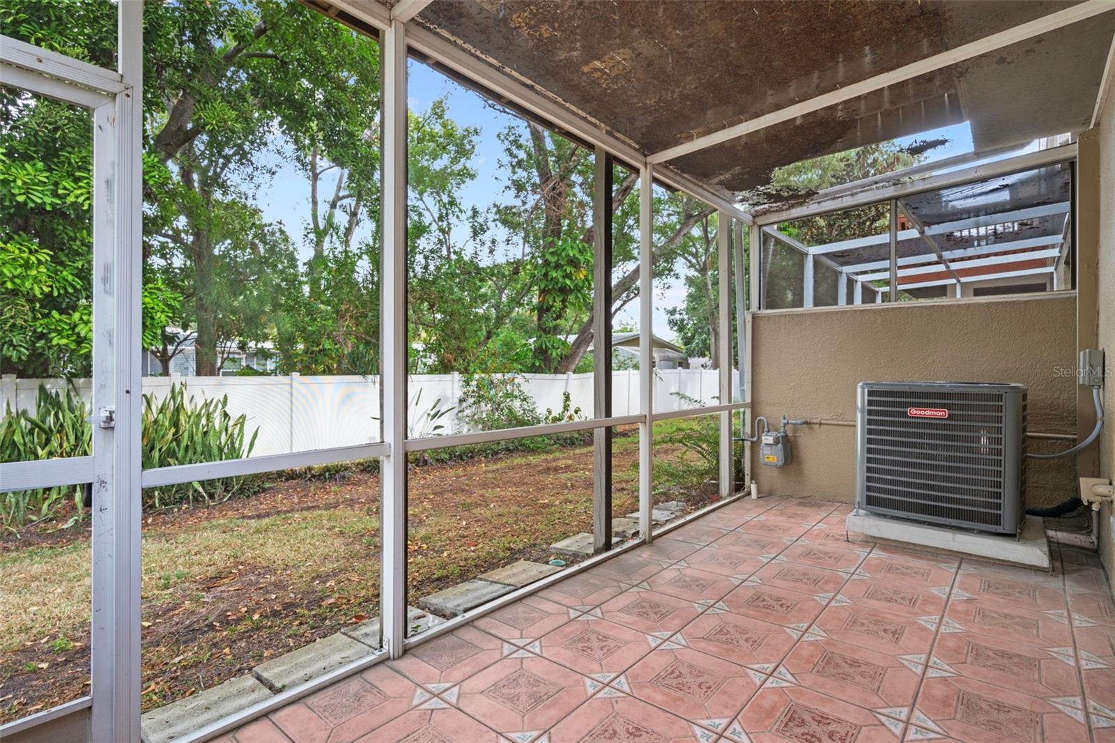 The Screened In Porch is located off of the fourth bedroom and has gorgeous outdoor tile