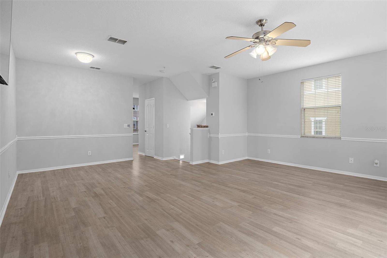 The Living Room has gorgeous luxery vinyl plank flooring throughout the second floor