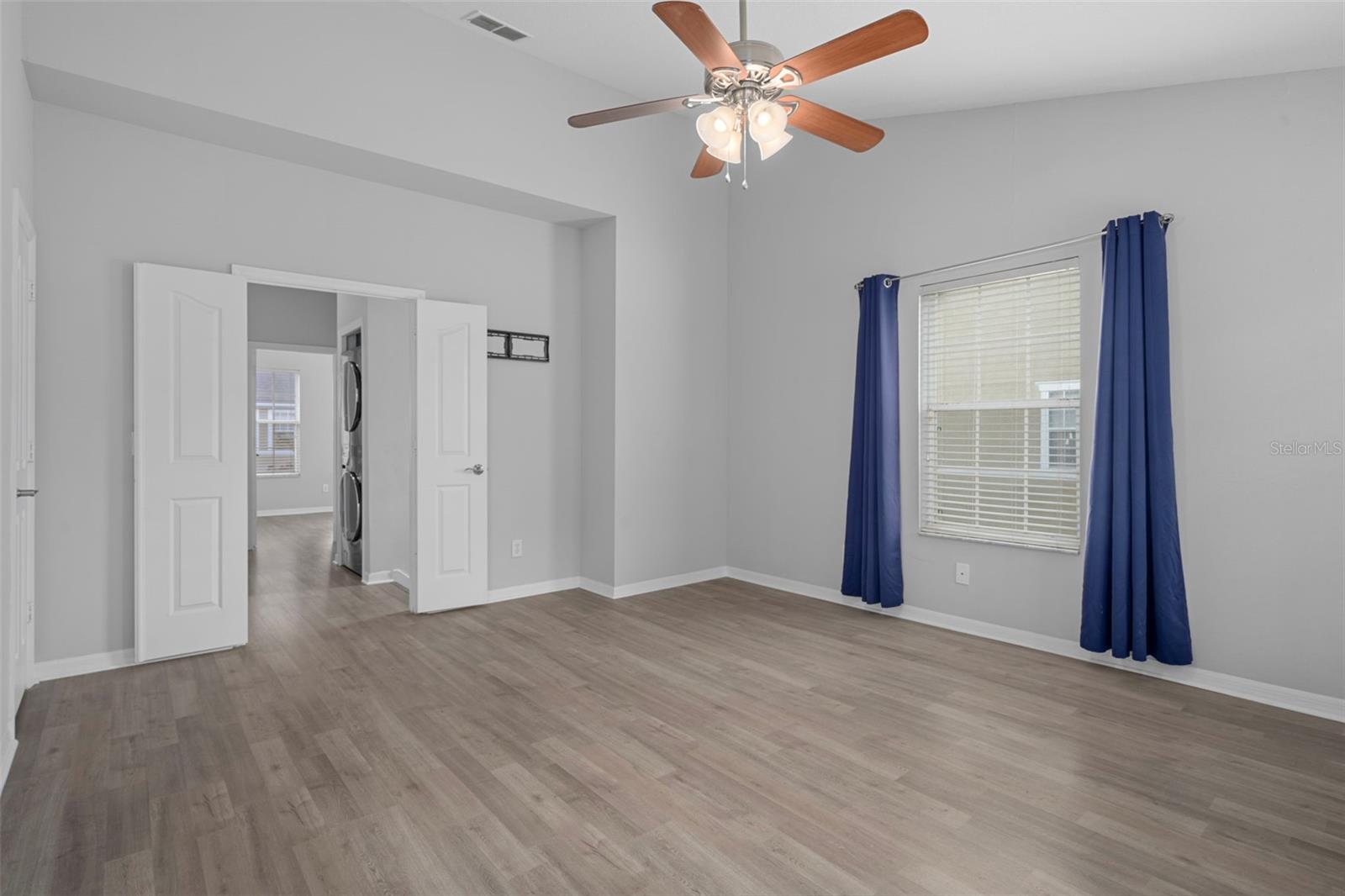 The Master Bedroom has lots of natural light !!