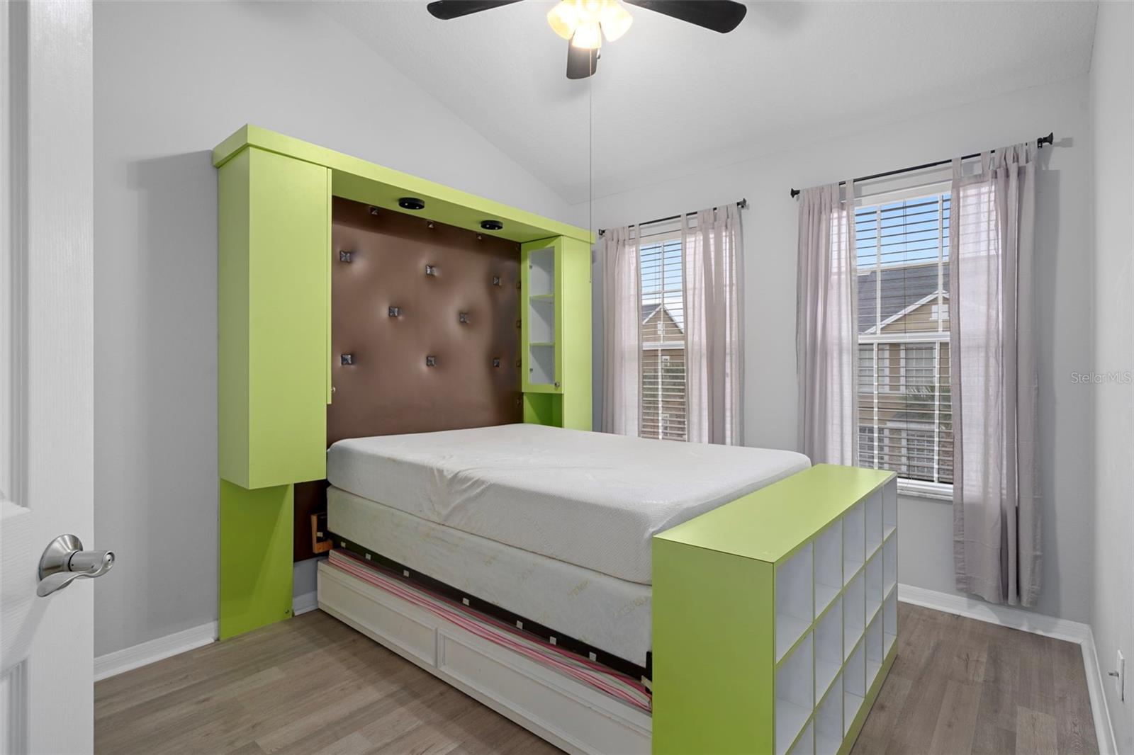 This is the second bedroom, there is a fan/light and large closet too. The Doble bed with trundle bed under it can stay !!