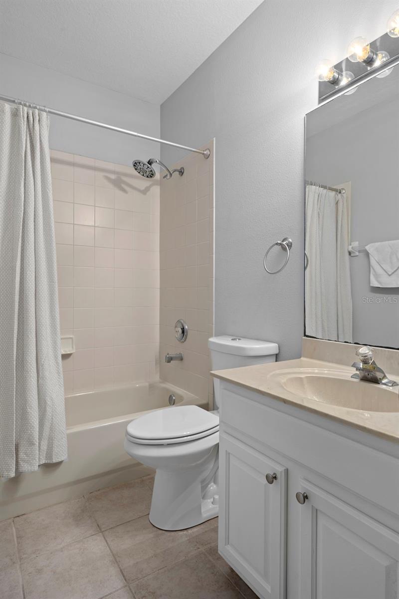 There is a tub/shower combo in the guest bathroom