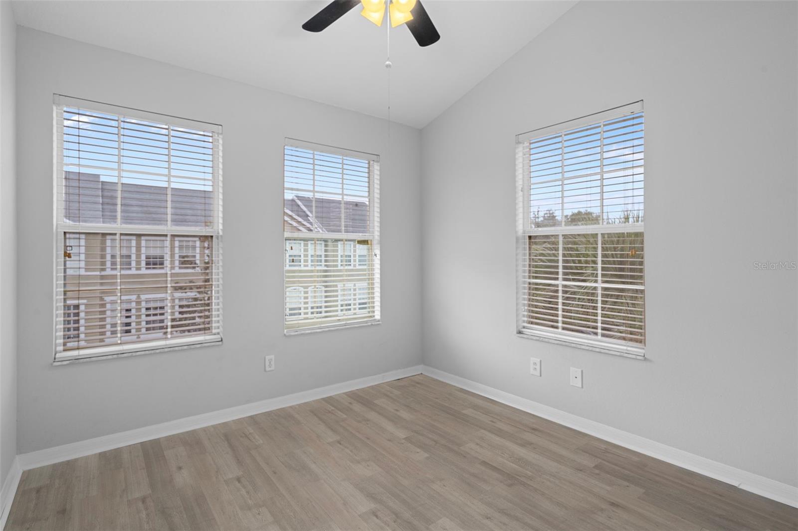 This is the third bedroom, lots of natural light in this room and a fan/light too