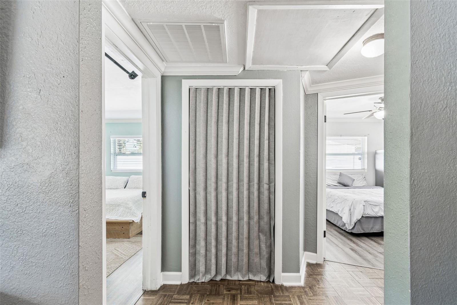 Storage Closet in hallway between the two bedrooms.
