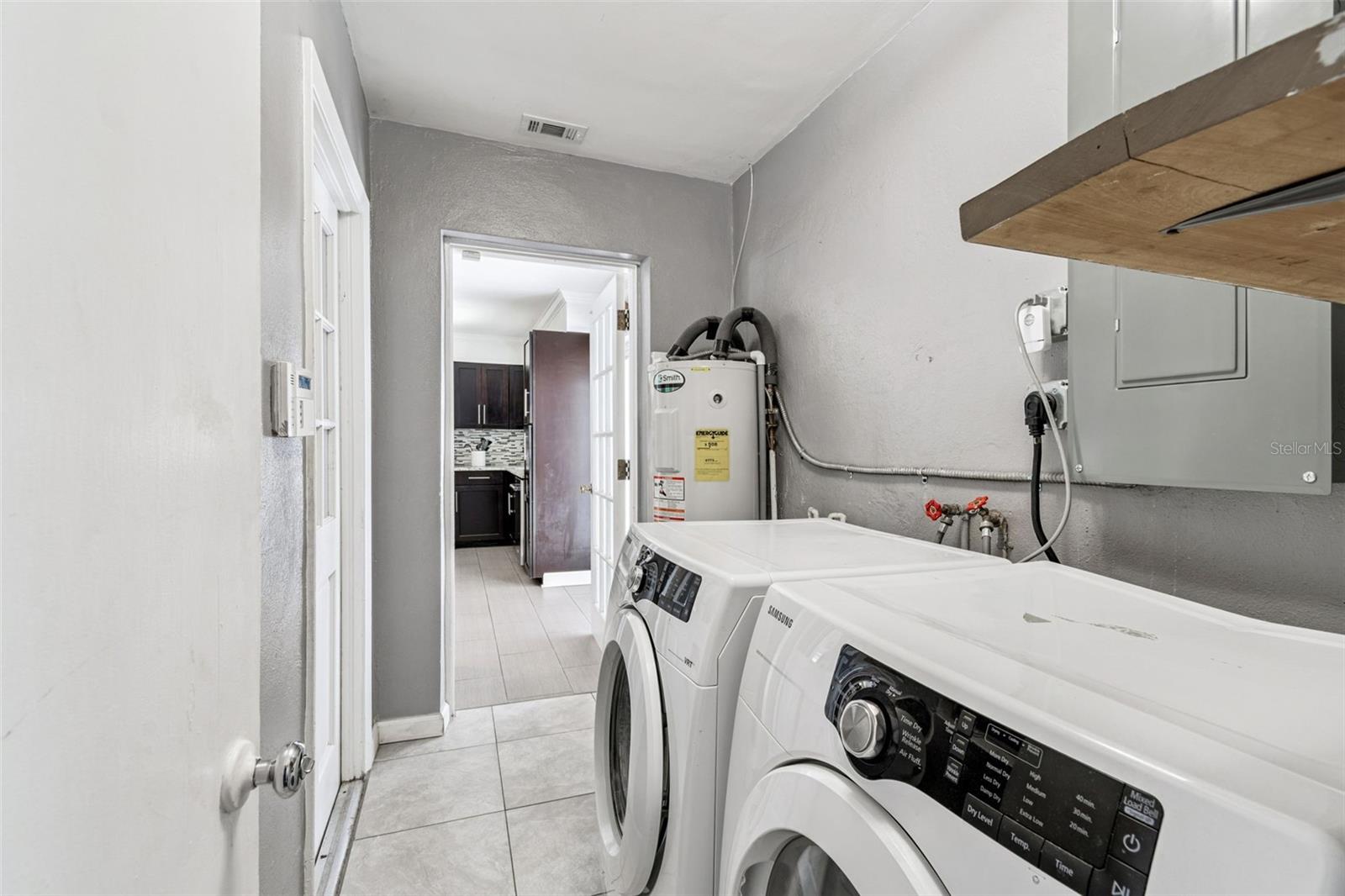 Laundry room and half bathroom space, air conditioned