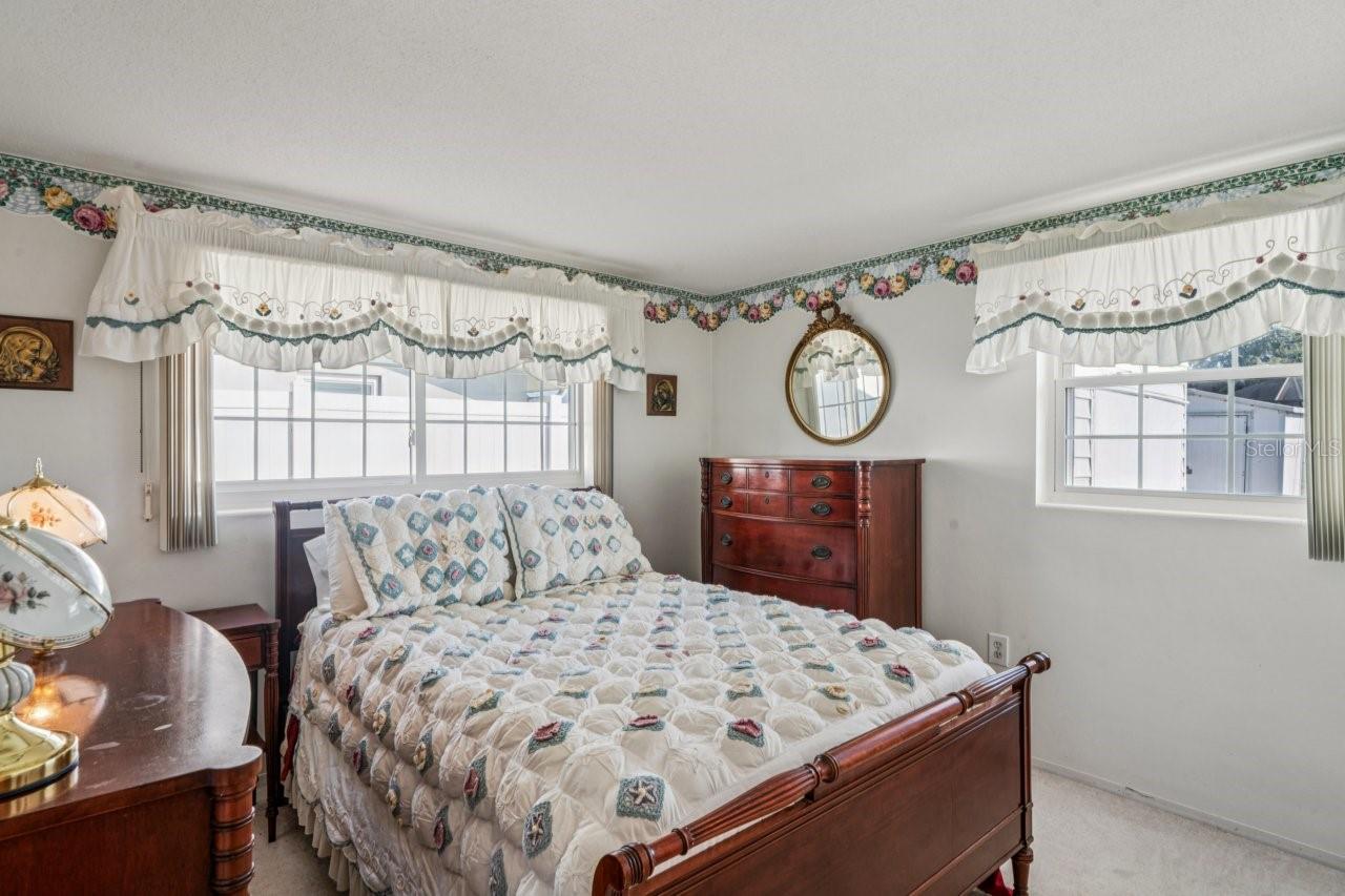 Guest bedroom has carpeting