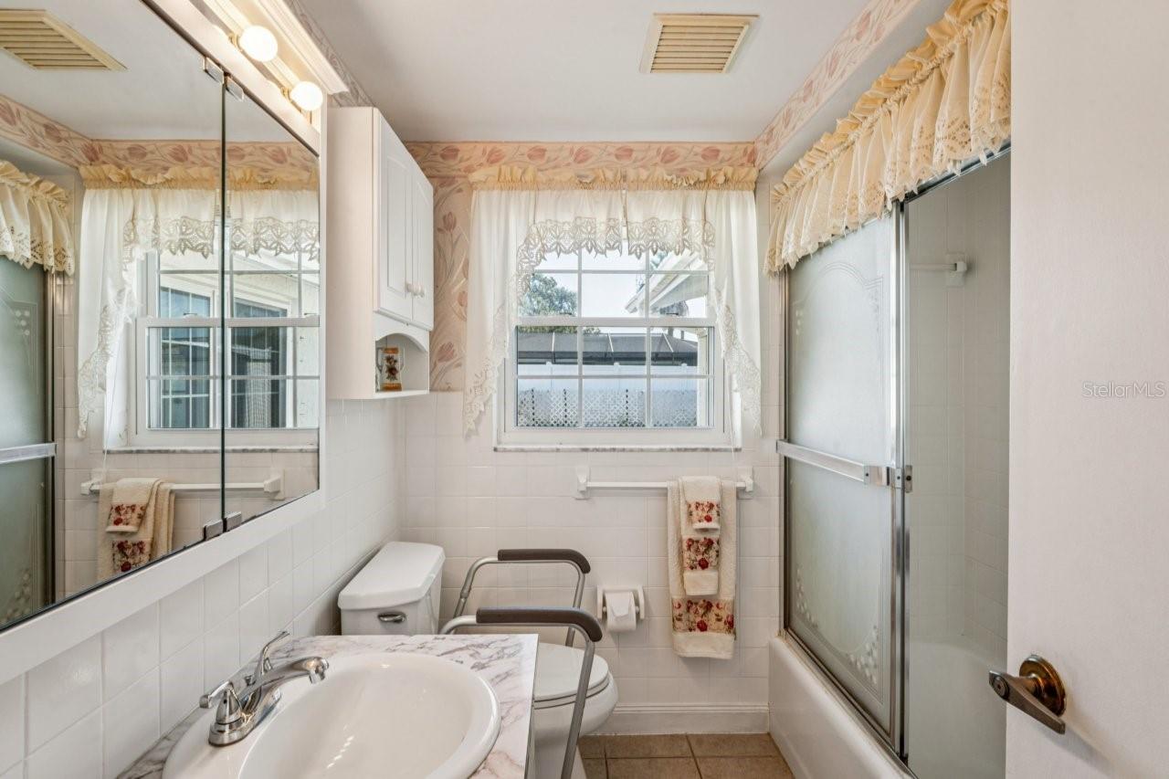 Safety bar on commode can be removed.